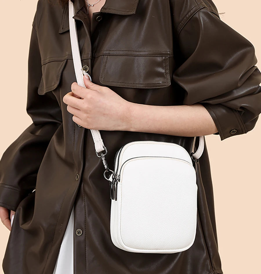 Nouveau 100% véritable peau de vache femmes en cuir sac de téléphone portable sacs à bandoulière pour femmes Sac concepteur Sac à bandoulière sacs de messager Sac