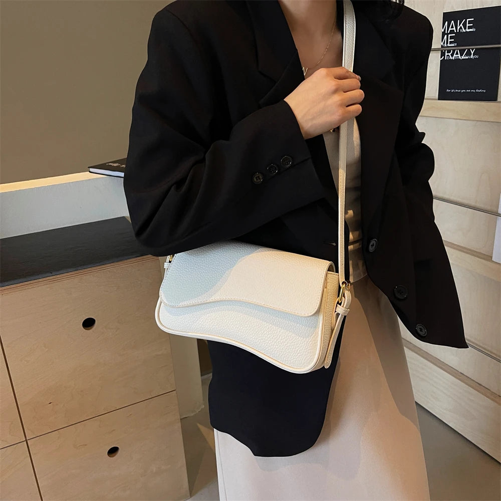 sac de luxe femme sacs bandoulière sac de luxe femme haute qualité MOODS formes irrégulières sacs à bandoulière pour femmes rouge litchi motif rabat sac à bandoulière décontracté rue Simple mode cartables 2025
