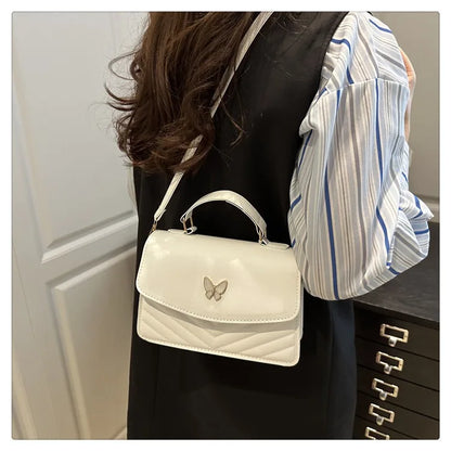 Sac papillon porte-bonheur pour femmes, nouvelle mode, couleur unie, texture simple, tendance, beau sac messager à bandoulière décontracté, portable, petit